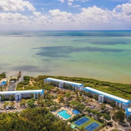 Chic Coastal Retreat with Pool, Marina, Beach Access & Resort-Style Amenities