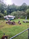 Comfortable Camper a few miles off thruway and area attractions. Fire ring wood