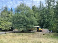 Bee Haven Bus at the RMR Farmstead with hot tub