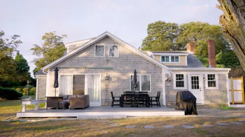 Walk to Rock Harbor Beach from your spacious Orleans coastal retreat