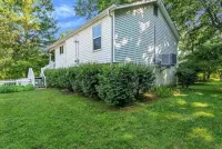 Beautiful Cottage on Large one Acre Private Lot