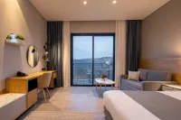 โลโกส์โฮเทลอินยะดฮัชโมนา โรงแรมใน