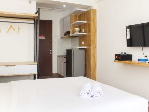 Homey and Cozy Studio at Riverview Jababeka Apartment