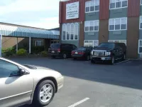 Claymore Inn and Suites - Parkplatz