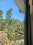 Homesick countryside (Wuyuan County high-speed railway station store) - غرفة مطلة على الجبل