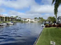Margaritaville Themed Condo, King Bed Suite, Waterfront + Pool, Near Downtown Hotels near Circle K