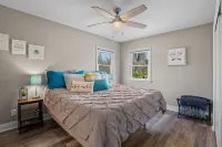 Cozy, year-round lake home with magnificent sunset views, lake access and dock.