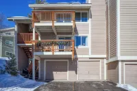 Remodeled sunny 1 bedroom condo in Meadow Village with heated garage