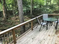 Cozy Cabin in Secluded Forest with Deck on Creek. Full Kitchen. 900 Square Feet.
