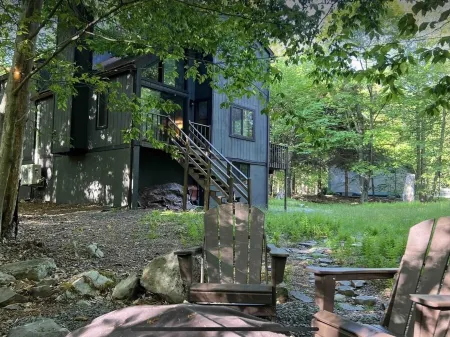 Wooded Retreat in Poconos Mountain Resort w/ Firepit and Kayaks!