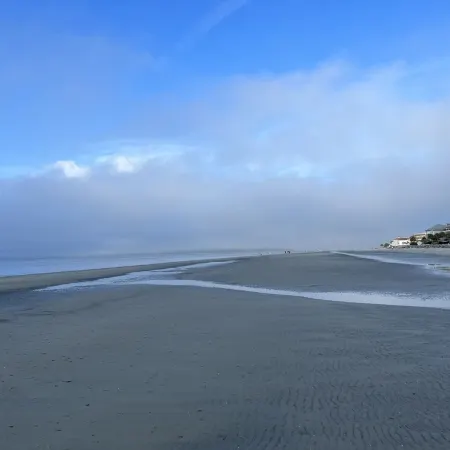 Stones throw from shore! Spacious multi-level townhome one row back from beach