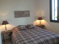 Spacious, cosy air-conditioned apartment in villa with pool near beach and shops