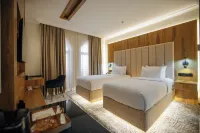 Kohinur Plaza Hotels near Hazrat Khizr Mosque