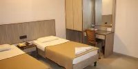 Hotel Niraj International - デラックスシングルルーム