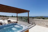Mandana Villa - with Heated Pool & Jacuzzi -  Ferienhäuser