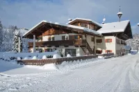 Gasthof Eiserne Hand Hôtels à : Fieberbrunn