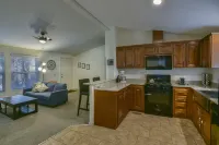 Modern Kitchen and Scenic Stream - Elegant Family Retreat