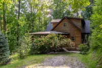 Creekside Cabin with Game Room and Fire Pit - Charming Family Haven