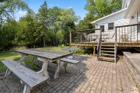 Spacious Backyard and Cozy Fire Pit - Charming Getaway Retreat