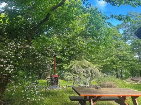 Osseo Lake Lodge  Unique Octagon Home with Sunset Views & Private Waterfront