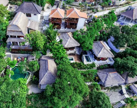 Twin Island Villas & Dive Resort Отели рядом с достопримечательностью «Twin Island Dive»