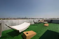 Urban Chic Rooftop Retreat with Balcony Views, Games, WiFi Hotels in Ukrainian Village