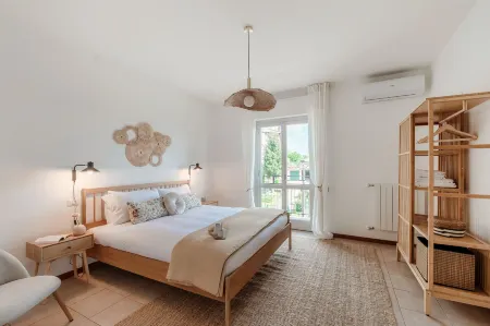 Moonlight - by Myhomeincomo Отели рядом с достопримечательностью «Parco di Villa Peduzzi»