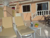 SPECTACULAR SUNNY APARTMENT WITH WIFI, POOL, PANORAMIC CLIFF & SEA VIEWS.