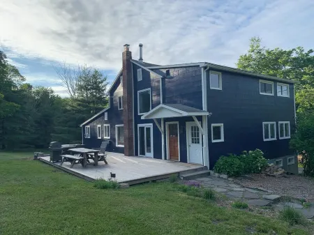 NEW LISTING! Cozy Country Farmhouse with Hot Tub