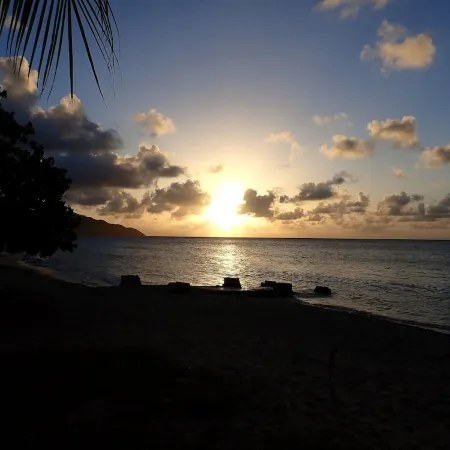 Minutes Walk to Cane Bay Beach- Porch Mountain Views, Sea from the backyard