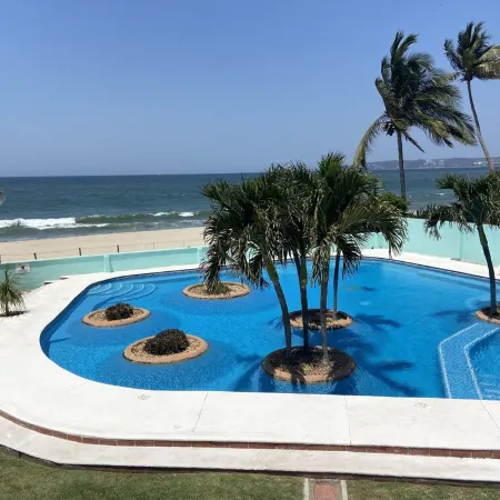 A pool and a beach… What else do you need? Check out my REVIEWS! GREEN!