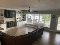 Centrally located, waterfront, Heated pool home.