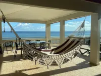 Oceanfront 3 Bdrm House on Surf Beach near Rincon with Private Beach Access Hotel a Aguada