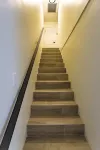 Modern Condo a few steps from sandy beach and resorts