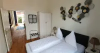 Friesischer Hof, Ferienwohnungen Mit Indoor Spielplatz, Kostenfreien Parkplatz Und W-Lan Hotels in Dornum