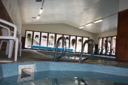 Economy Inn Отели рядом с достопримечательностью «Санд Мастер Парк - Сандбординг»