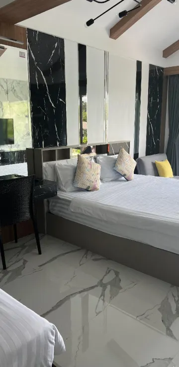 ห้องดีลักซ์เทอเรซพร้อมวิวทะเลหรือวิวสระว่ายน้ำ