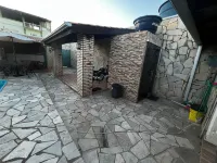 House with swimming pool and barbecue.