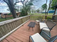 Monkey Island Escape sleeps 8, surrounded by nature with views of Grand Lake.