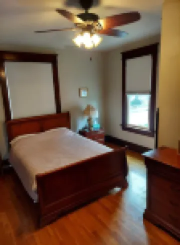 Charming historical 4 bd & 3 full ba home in Terre Haute with WiFi, AC & parking