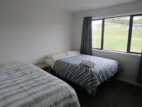 Apartment with lake, mountain & rural views.