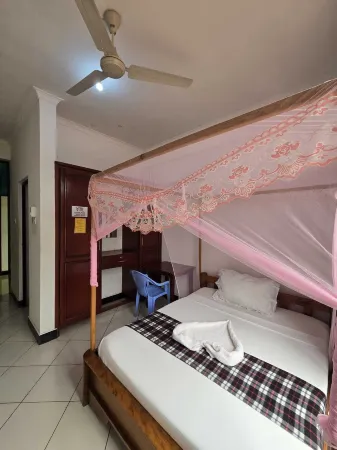 Tulivu Urban - Twiga Hotel Отели в г. Моши