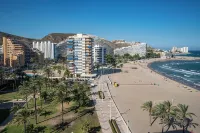 APARTMENT DESIGN 1 LINE BEACH WITH SWIMMING POOL, TENNIS COURT AND GARAGE. Hotels in Cullera