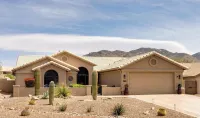 Charming 2-bedroom 2 bath home in Saddlebrooke one with private back yard.