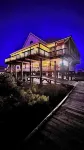 Majestic bayfront home. 450’ pier w/ boat access, crabbing, fishing, & swimming.