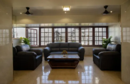 Setrac Orange Hoteles cerca de Belapur Mango Garden