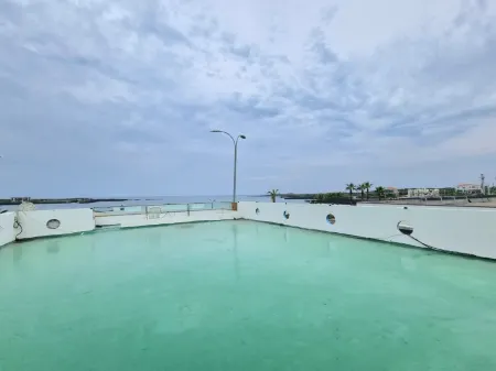 Jeju Udo Sun Beach Pension Отели рядом с достопримечательностью «Остров Удо»