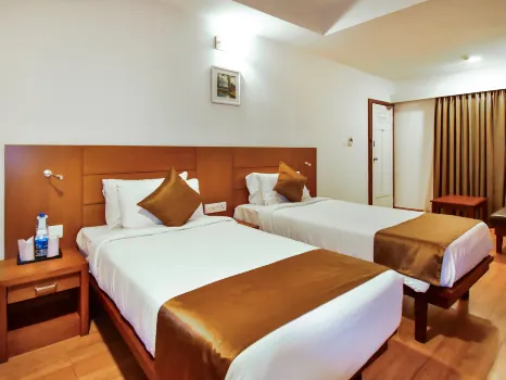 Hotel Panchavady Hotels near Dhanya Theatre