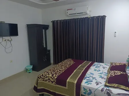 Rain Homestay Отели рядом с достопримечательностью «Кидангампарамбу Сри Буванесвари Темпл»