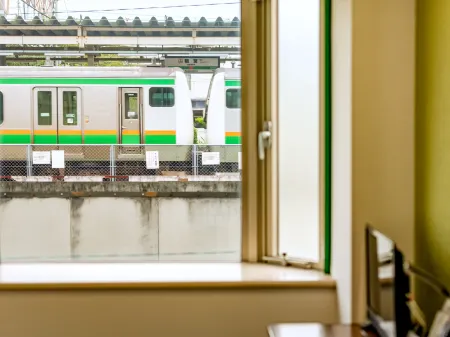 Kamonomiya Station Hotel Отели рядом со станцией Yui Festival Railway Station